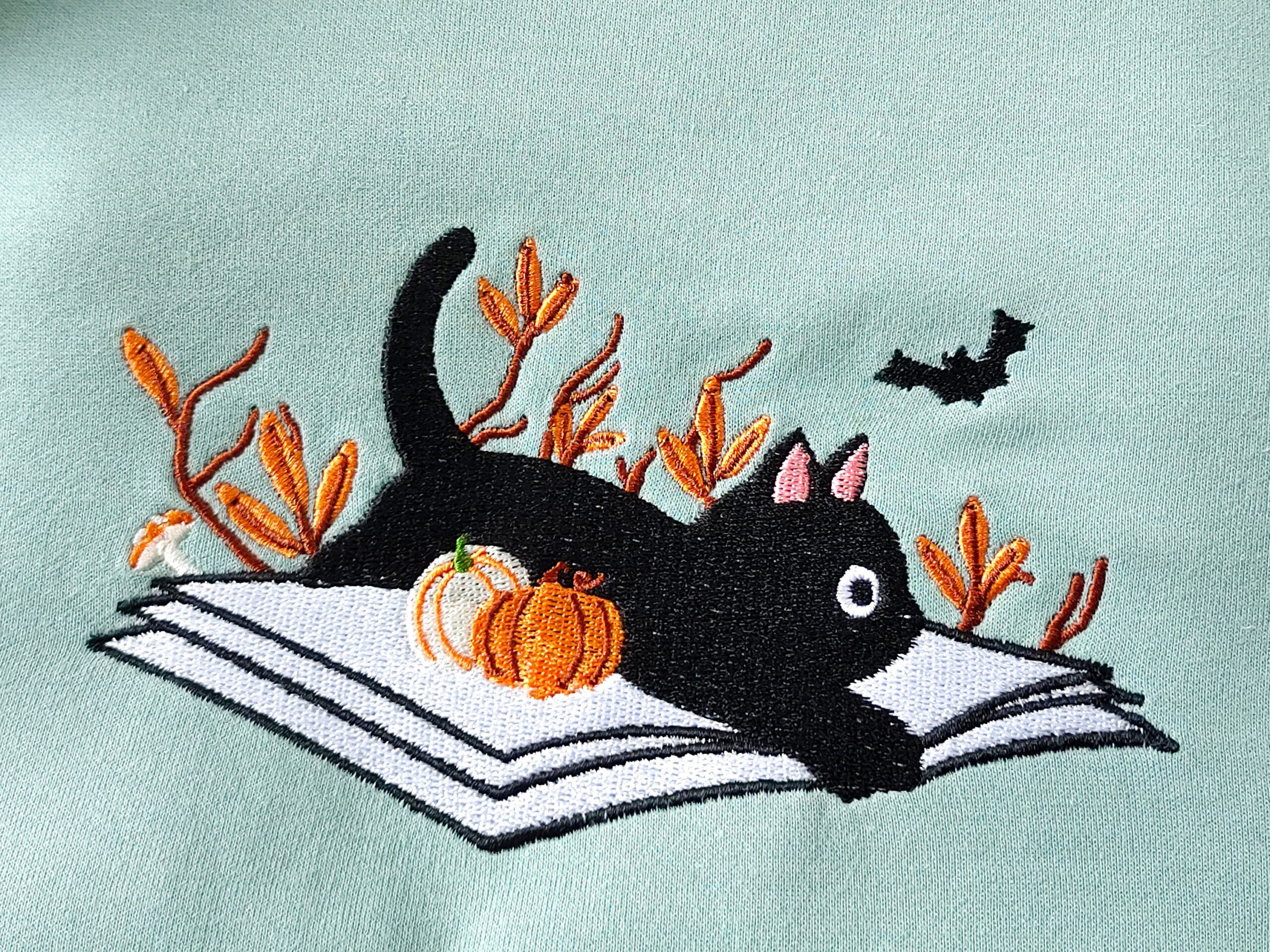 Halloween Fall Embroidered Black Cat Lying On Book Sweatshirt image 4