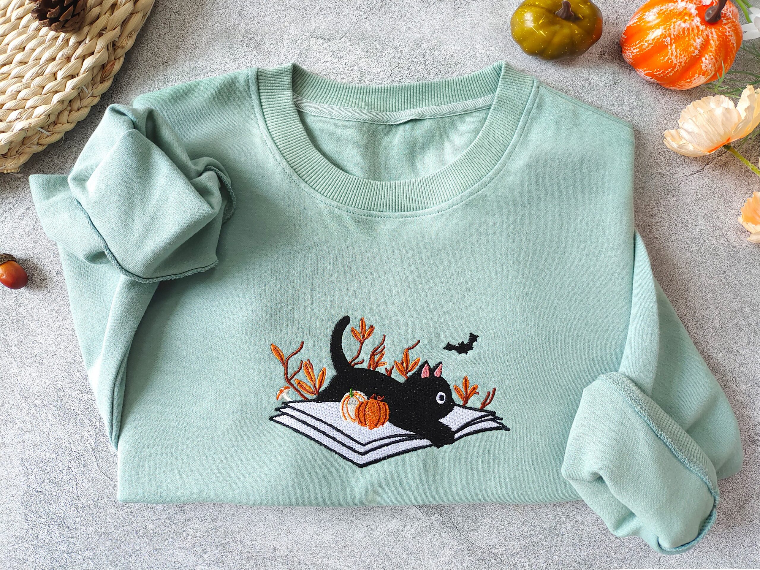 Halloween Fall Embroidered Black Cat Lying On Book Sweatshirt image 1