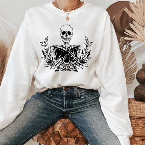 Skeleton With Book Reading Lovers Librarian Women's Halloween Sweatshirt image 0